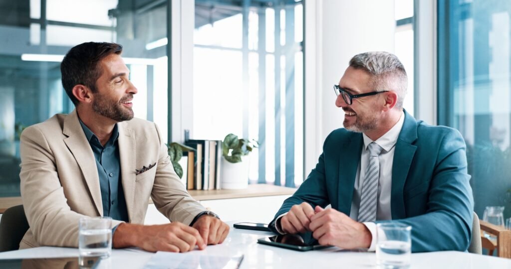 Discussion, financial portfolio or happy business people in meeting for teamwork, investment profit